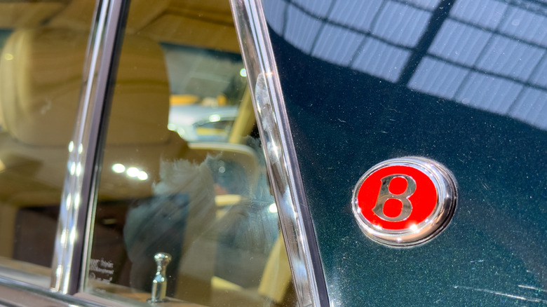 Chrome window trim of an old Bentley luxury car