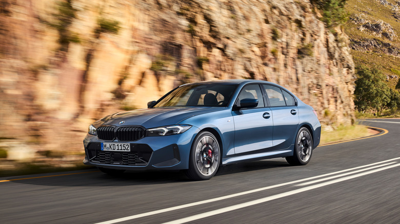 2026 BMW 3 Series dynamic image front 3/4 view