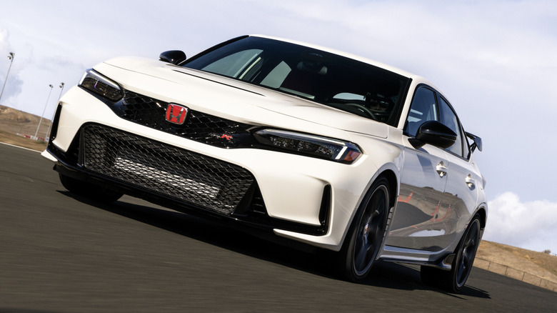 front 3/4 view of a white Honda Civic Type R on track