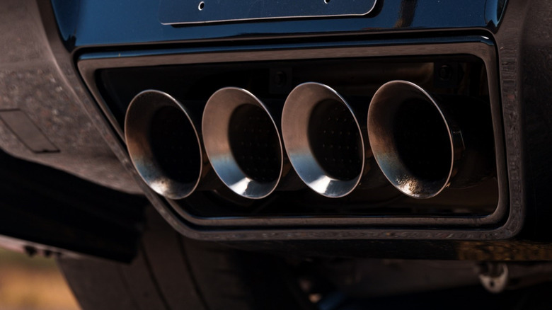 A photo showing the quad exhaust tips of a car