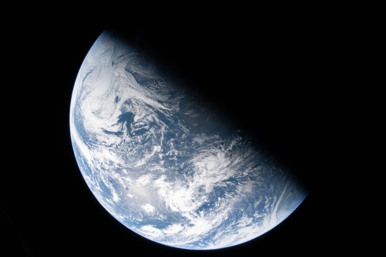 A view of Earth taken by NASA astronaut and Artemis II Commander Reid Wiseman from one of the Orion spacecraft's four windows after completing the translunar injection burn on April 2