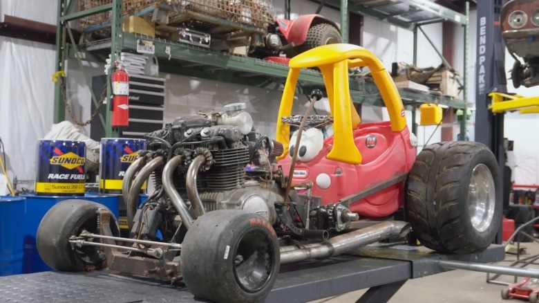 Cars and Cameras' Little Tikes Cozy Coupe go-kart with a 550cc motorcycle engine