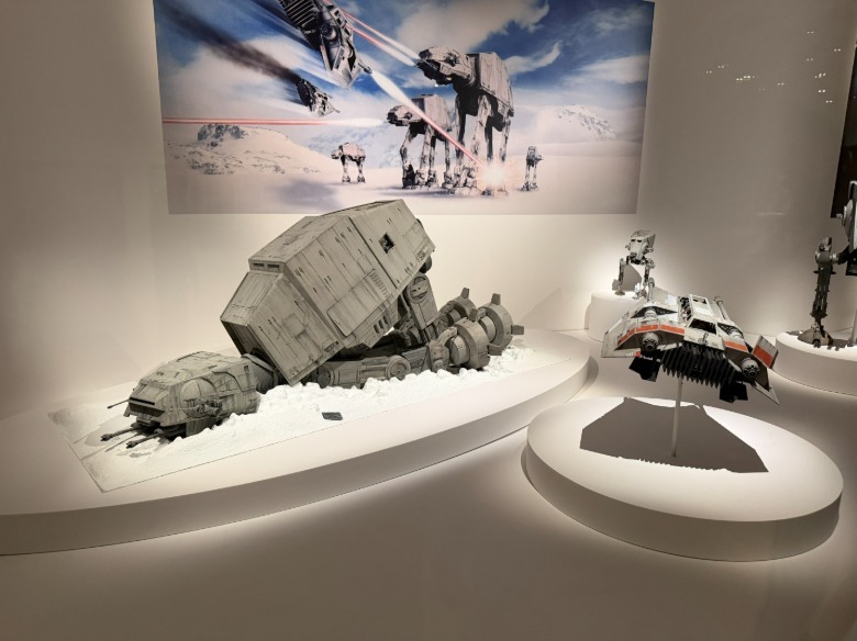 A speeder and AT-AT from