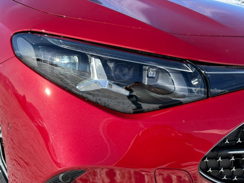 headlight on a red 2027 Mercedes-Benz CLA220 4Matic hybrid