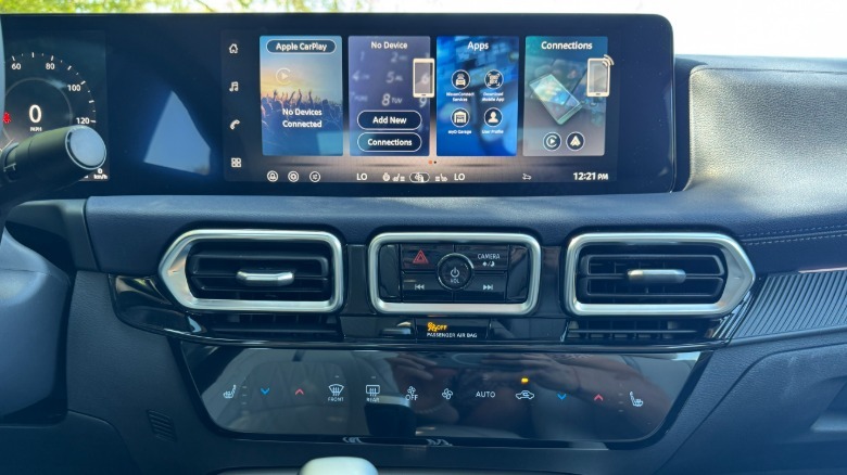 A close-up of nan caller integer ambiance controls successful nan 2026 Sentra SL showing nasty reflections