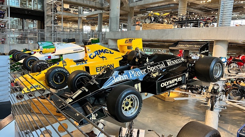 Vintage Formula 1 cars suspended over the floor at the Barber Vintage Motorsports Museum