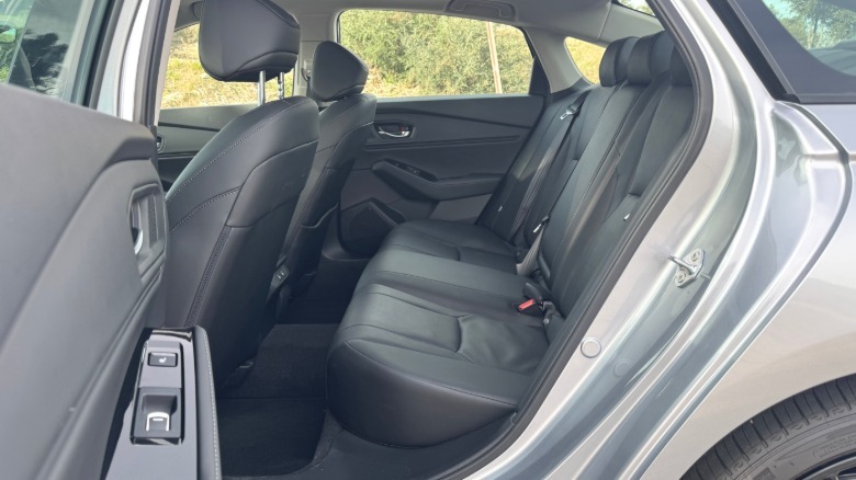 A look in the rear door at the silver Accord's black leather interior and cavernous rear seats