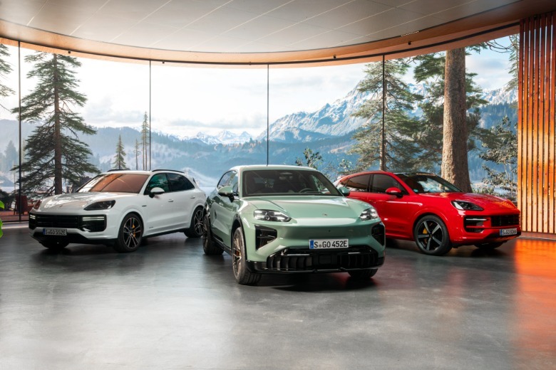 A Porsche Cayenne EV with two gas-powered Cayennes