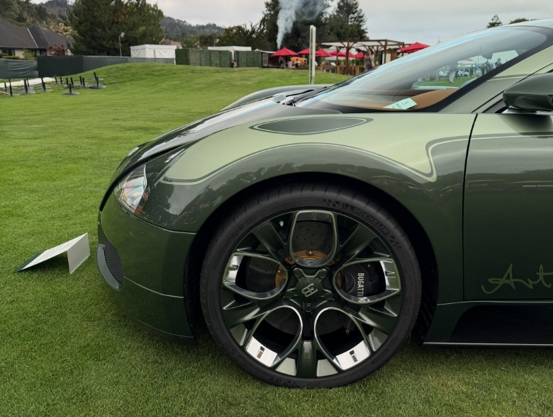 Front wheels of a green Bugatti Veyron