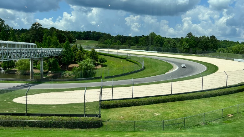 A view of the track at Barber Motorsports Park from inside the motorcycle museum