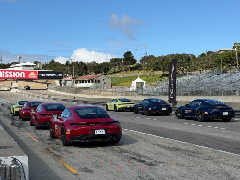 Porsche 911s in the pit lane at Laguna Seca