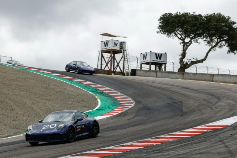 Porsche 911s on track at Laguna Seca