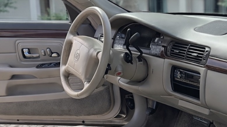 AI-altered interior of a 1999 Cadillac DeVille featuring two column shifters