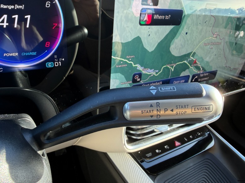 gear shifter in a red 2027 Mercedes-Benz CLA220 4Matic hybrid