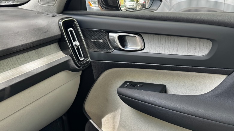 A close-up of the interior of the passenger side door where it meets the dashboard
