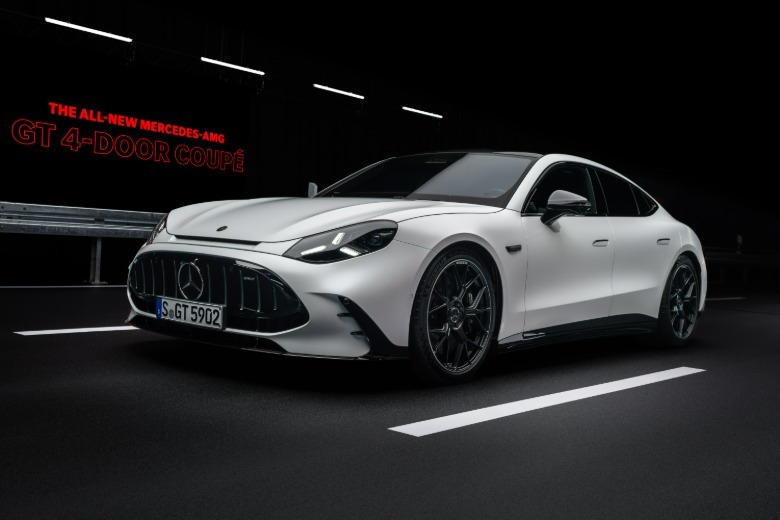 Front 3/4 view of a white 2027 Mercedes-AMG GT 4-Door Coupe EV