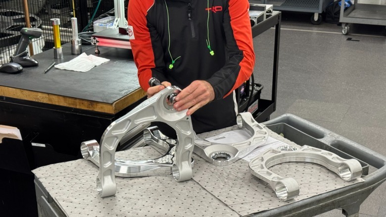 A photo of a TRD employee checking recently milled