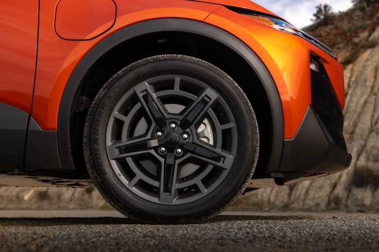 Front wheel of an orange Subaru Uncharted