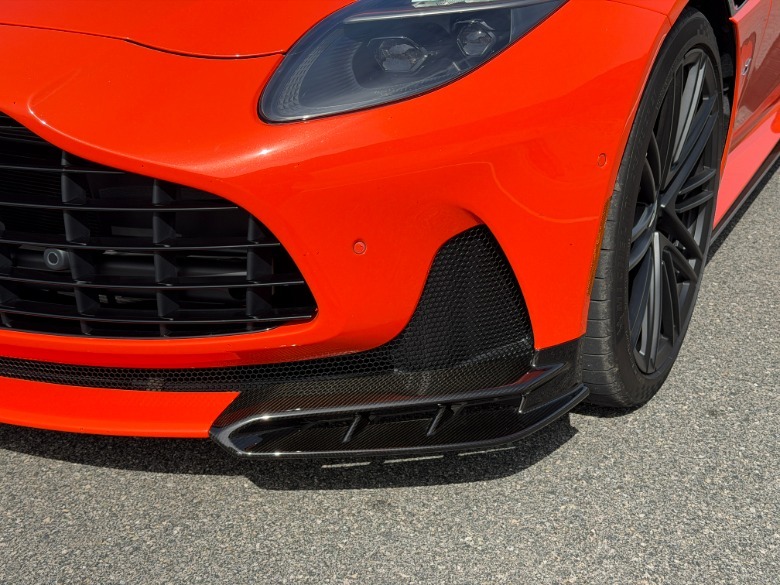 Front splitter of an orange Aston Martin DB12 S