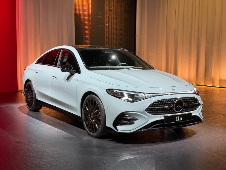Front 3/4 view of a grey Mercedes-Benz CLA
