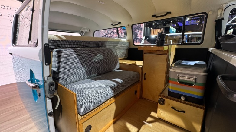 A look at Azul's restored interior showing a black and white houndstooth bench seat