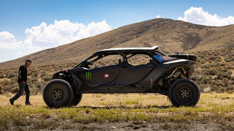 A 2026 Can-Am Maverick R MAX X RS stopped in the middle of the desert