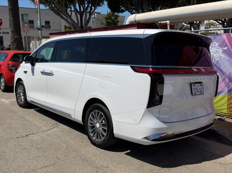 Rear 3/4 view of a white Faraday Future FX Super One