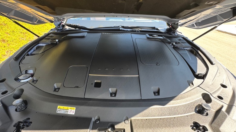 A look under the hood of the electric ES350e showing a bunch of black plastic