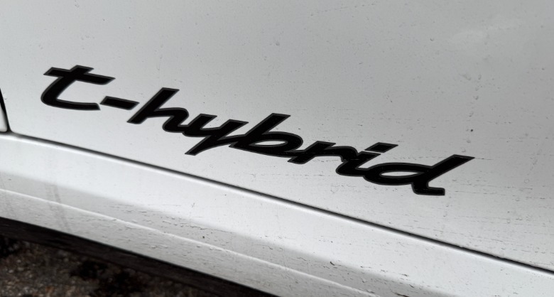 White 2025 Porsche 911 Carrera GTS Cabriolet badge