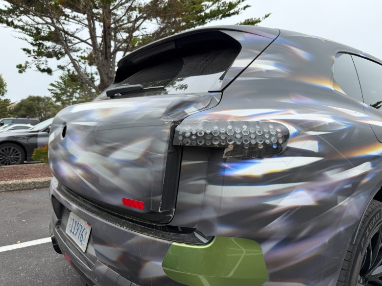 Rear end of a camouflaged Bentley Torcal EV prototype