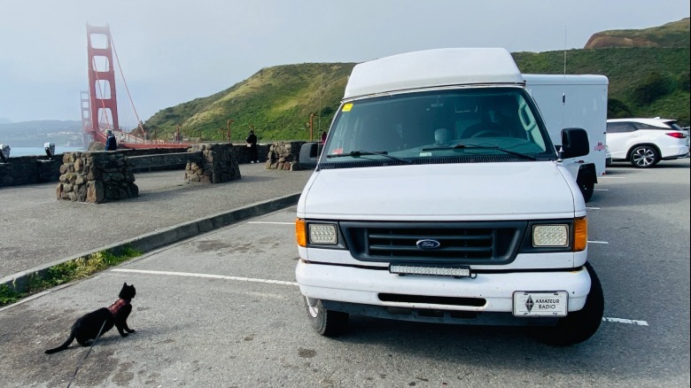 My 2003 Ford E-250 camper van parked next to the Golden Gate Bridge in San Francisco