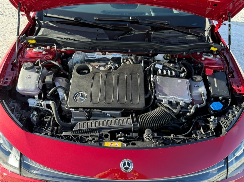 engine of a red 2027 Mercedes-Benz CLA220 4Matic hybrid