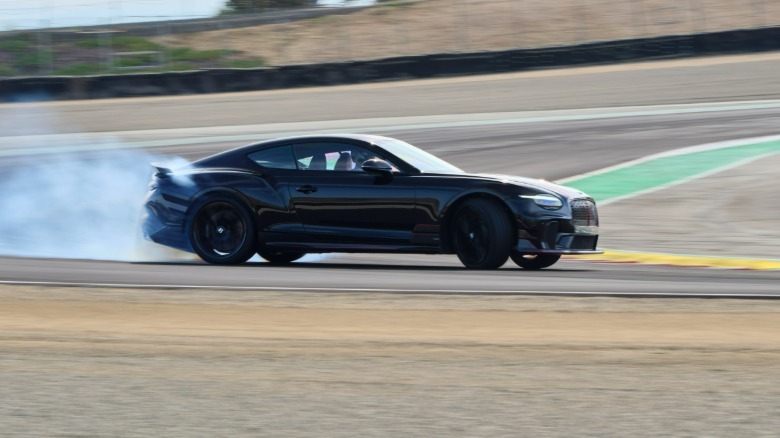 Side view of a 2027 Bentley Supersports drifting