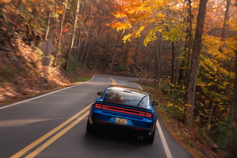 Rear position of a bluish 2026 Dodge Charger Sixpack Scat Pack