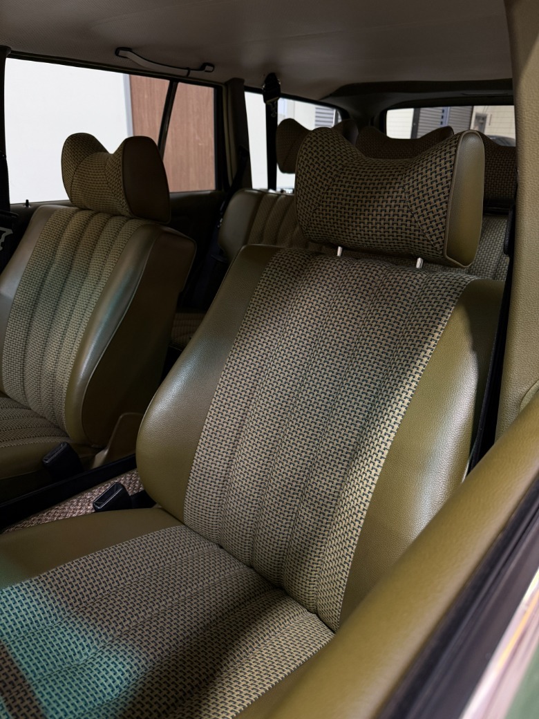 Front seat of a green 1979 Mercedes-Benz 280TE