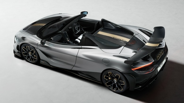 Rear 3/4 view of a silver McLaren 788HS Spider