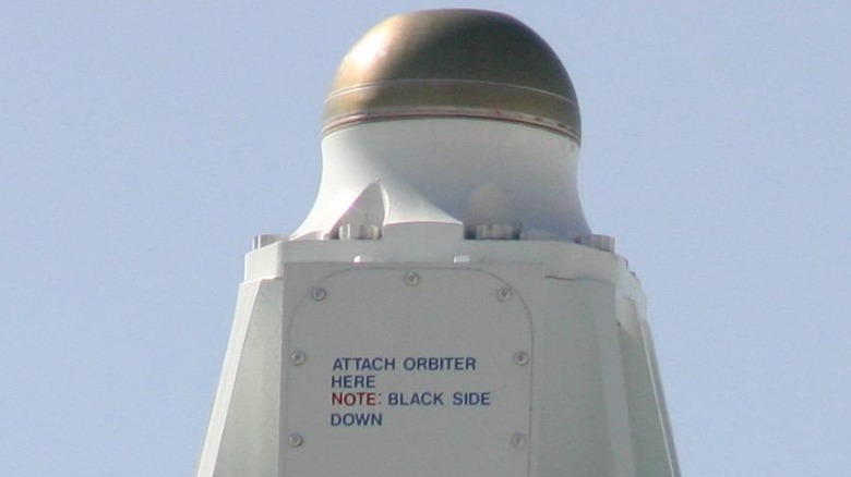 Humorful note on one of the SCA's three mounting point's on how to mount the shuttle to the back of the aircraft