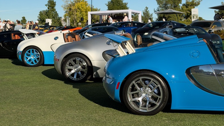 Rear ends of 3 Bugatti Veyrons