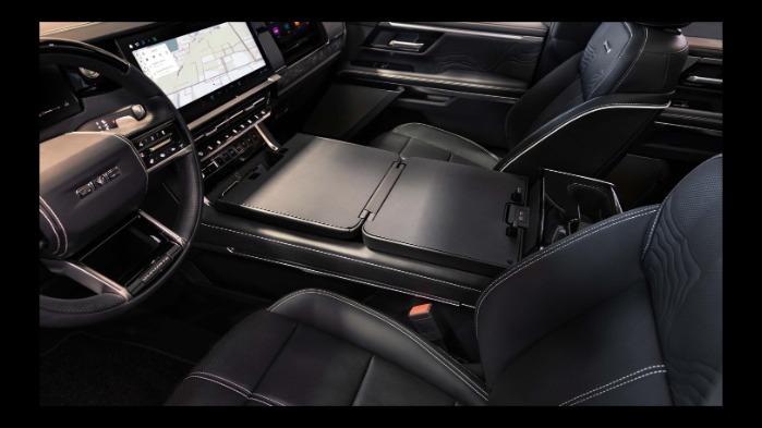 2027 GMC Sierra interior cabin configurable center console workspace