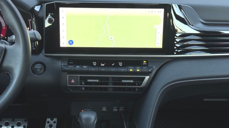 A close-up of the center stack in the black interior of the Camry Nightshade