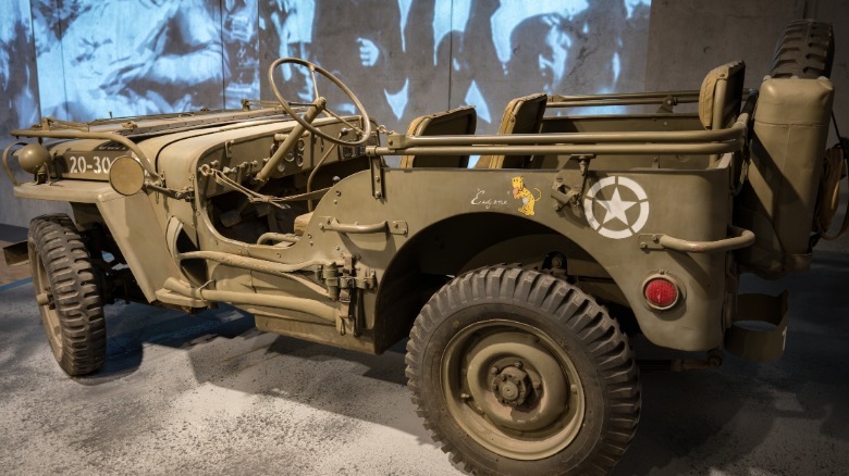 An open-top Willys MB Jeep in a museum.