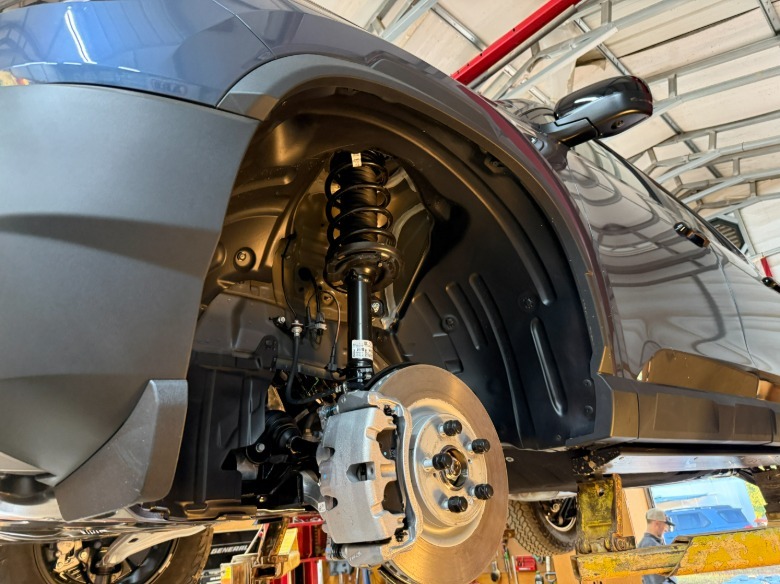 2027 Honda Passport TrailSport front suspension and brake assembly