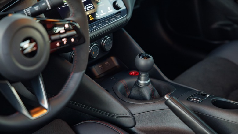 A look at the Z NISMO's manual transmission in a car with a black interior