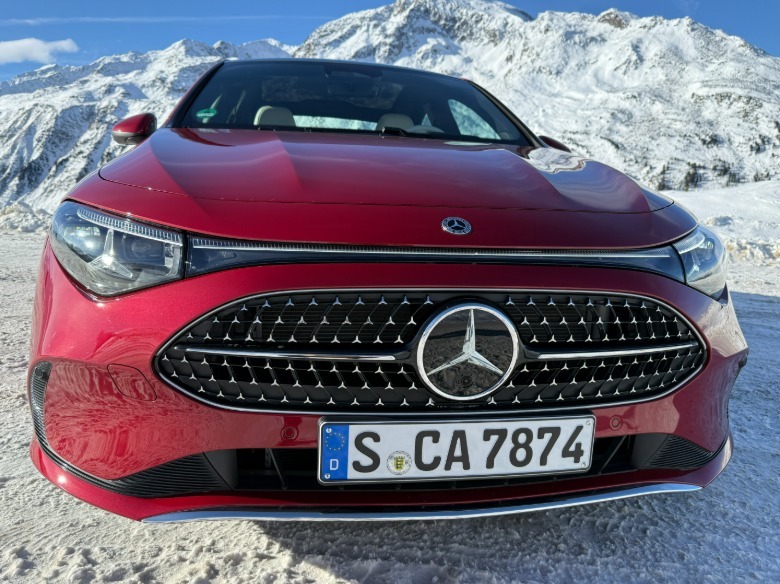 Front view of a red 2027 Mercedes-Benz CLA220 4Matic hybrid