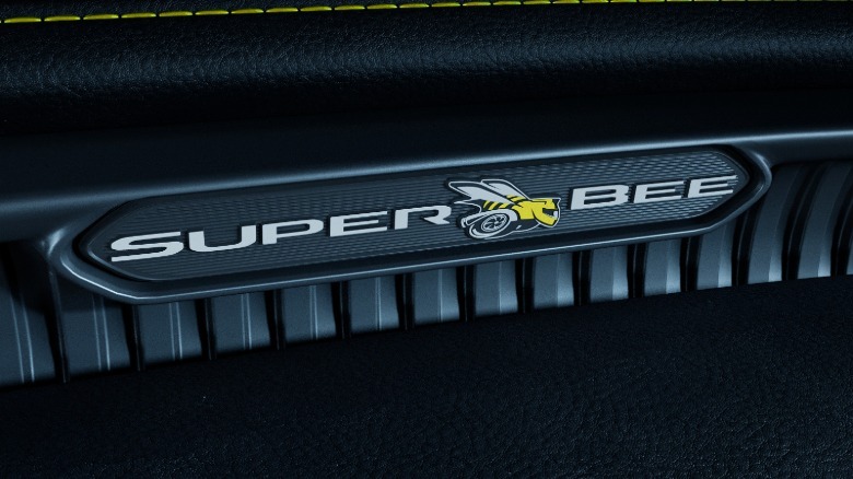 a close-up of the new Super Bee logo on the black dashboard of the Charger Super Bee