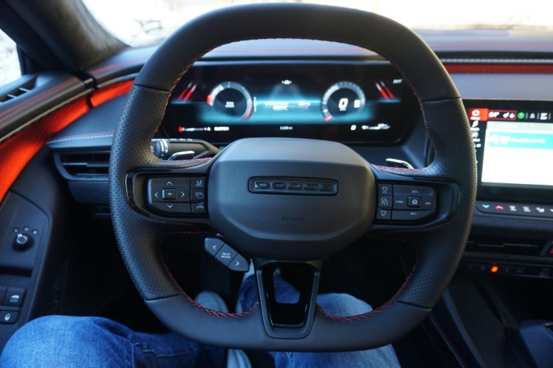 Steering instrumentality of a bluish 2026 Dodge Charger Sixpack Scat Pack