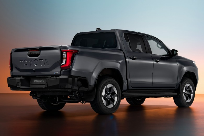 Rear 3/4 view of a new Toyota Hilux EV