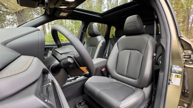A look in the driver's door at the Forester Wilderness' black seats and open sunroof