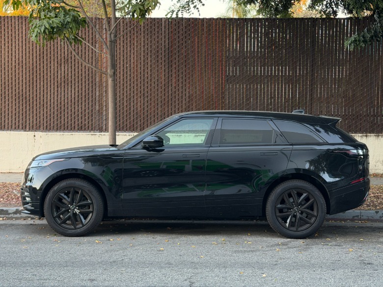 Side view of a black Range Rover Velar