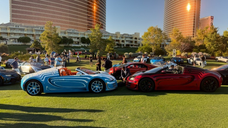 Two Bugatti Veyrons parked nose-to-nose